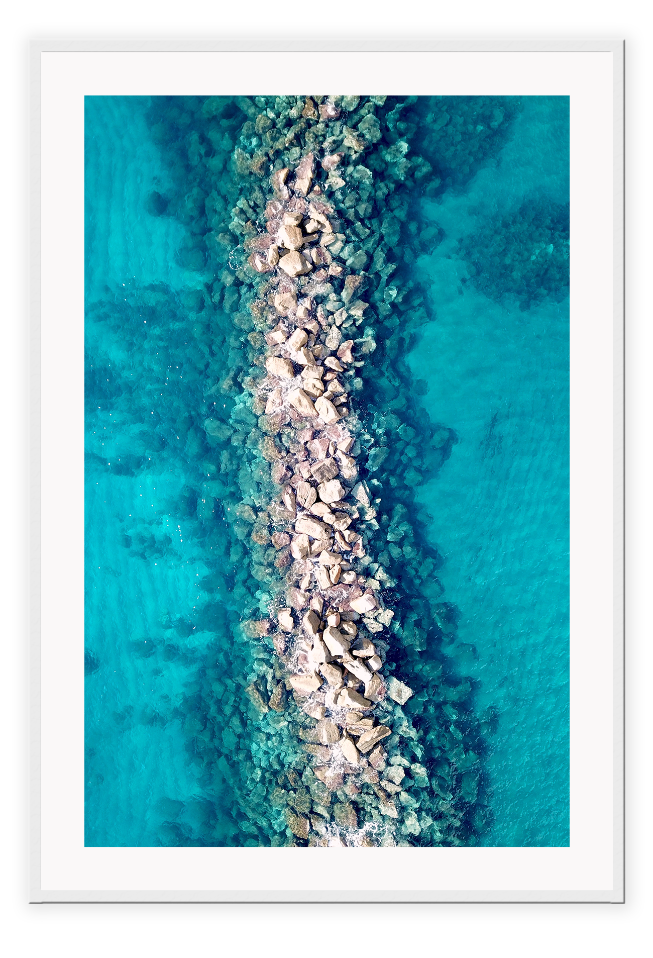 Ocean water rocks blue symmetry waves ripple clear sea